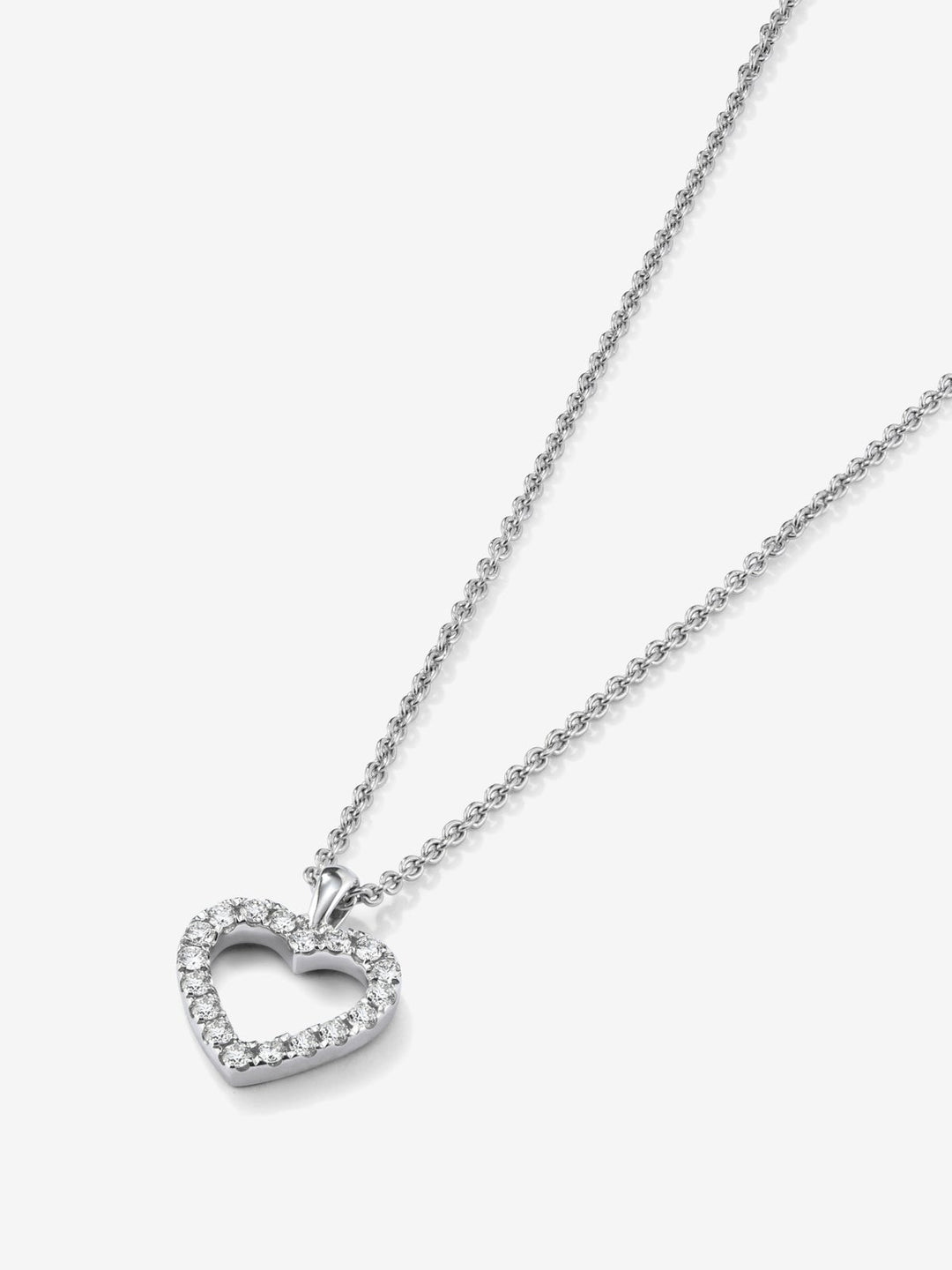 Colgante corazón de oro blanco de 18kt con diamantes de 0,22cts